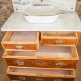 Antique washbasin cabinet from 1928 in wood and marble with a lighted mirror.
