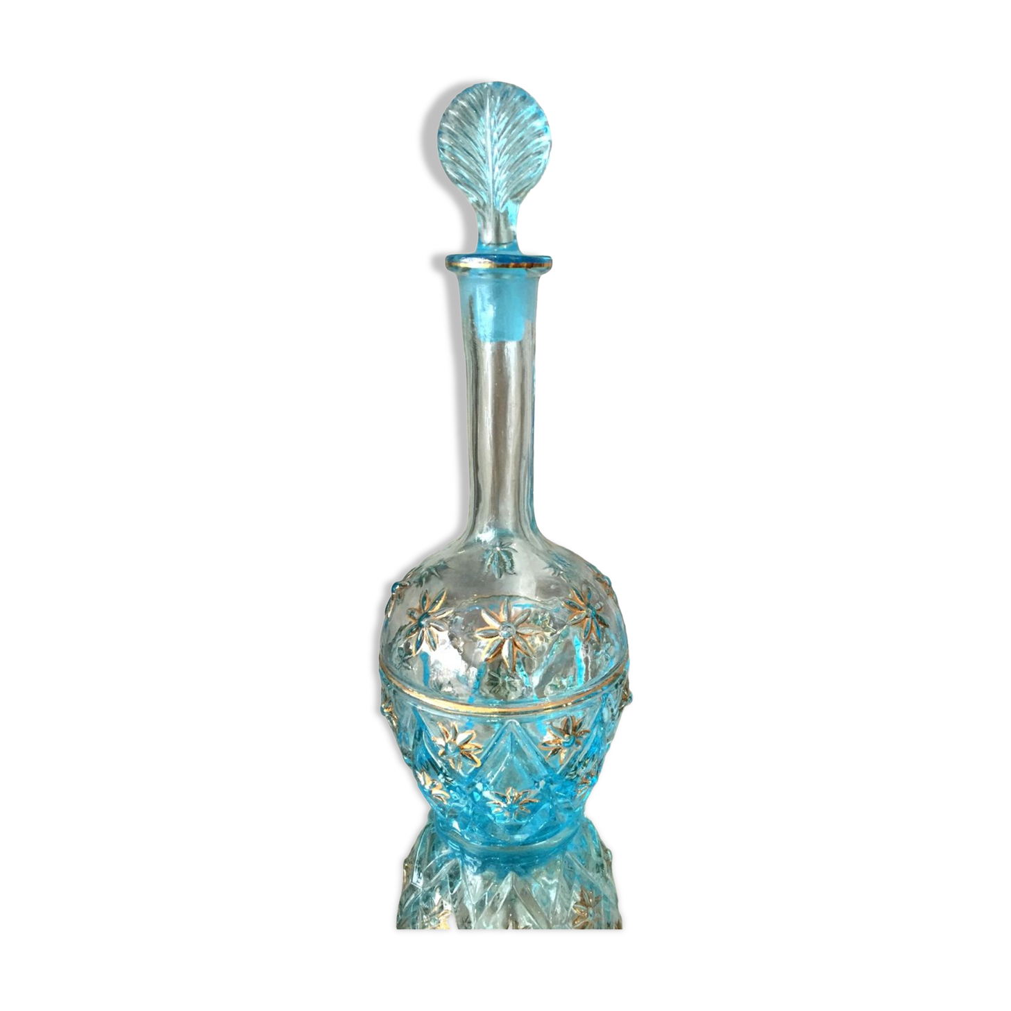 Turquoise blue liquor decanter and glass gild mold press of the 1950s