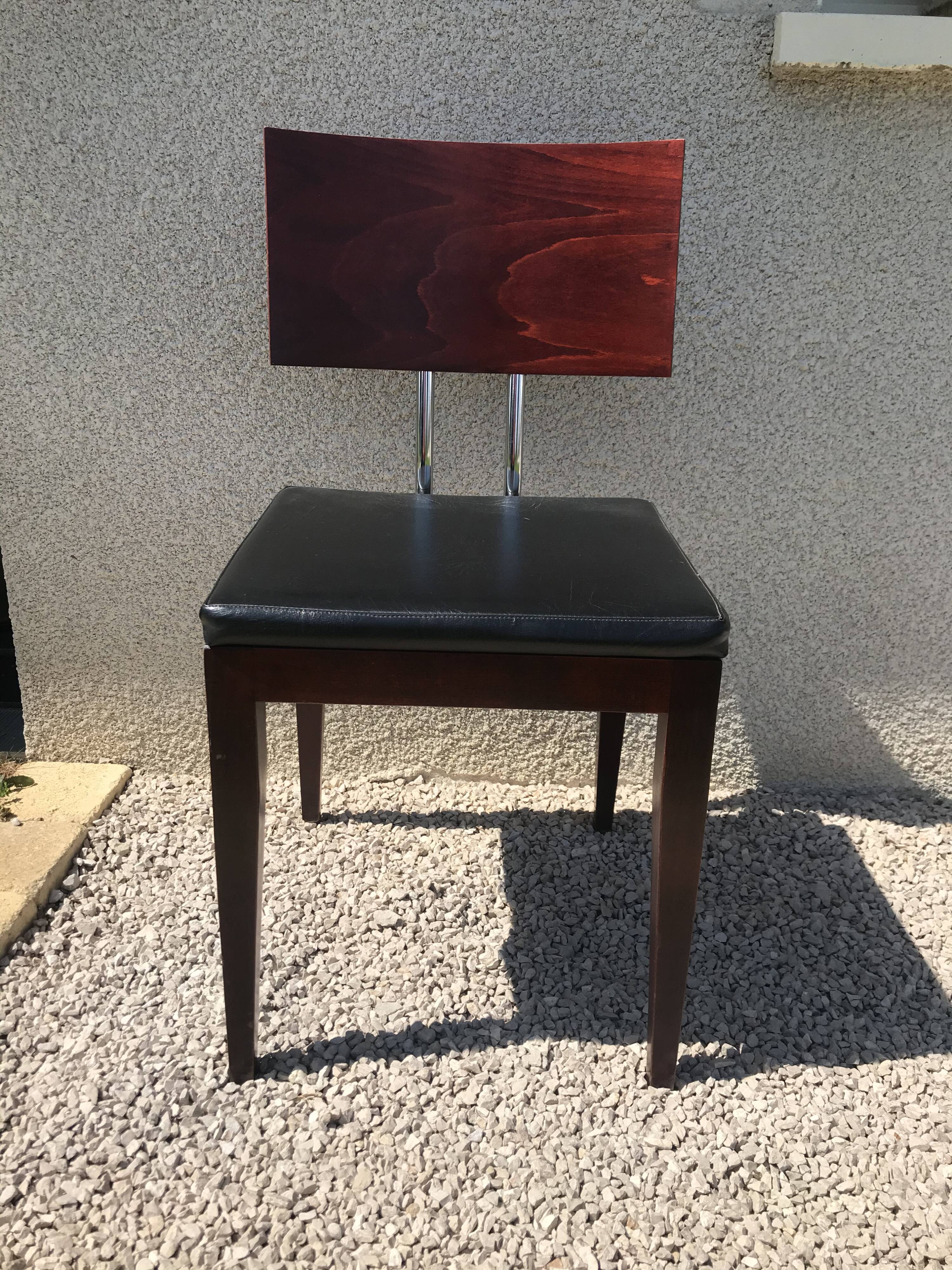 Suite de 9 chaises skaï noir et chrome scandinave