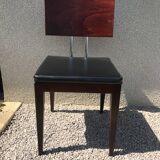 Suite of 9 black skai chairs and scandinavian chrome