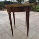 Gray marble mahogany pedestal table and brass gallery