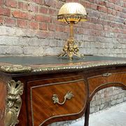 Antique French-style desk with green leather top and bronze mounts