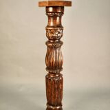 Large decorative column in richly carved wood