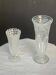 Set of two large, vintage, clear, molded glass vases on feet