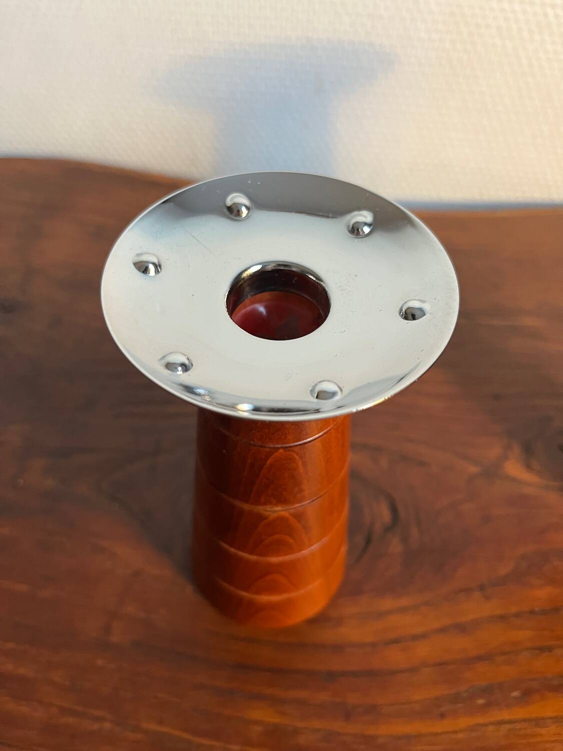 Pair of Guy Degrenne wooden and stainless steel candlesticks