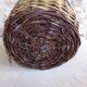 Dame-jeanne in her basket