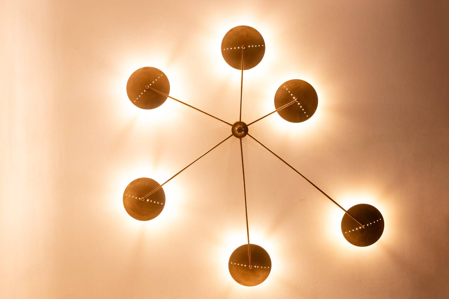 6-light wall sconce in patinated brass, contemporary work