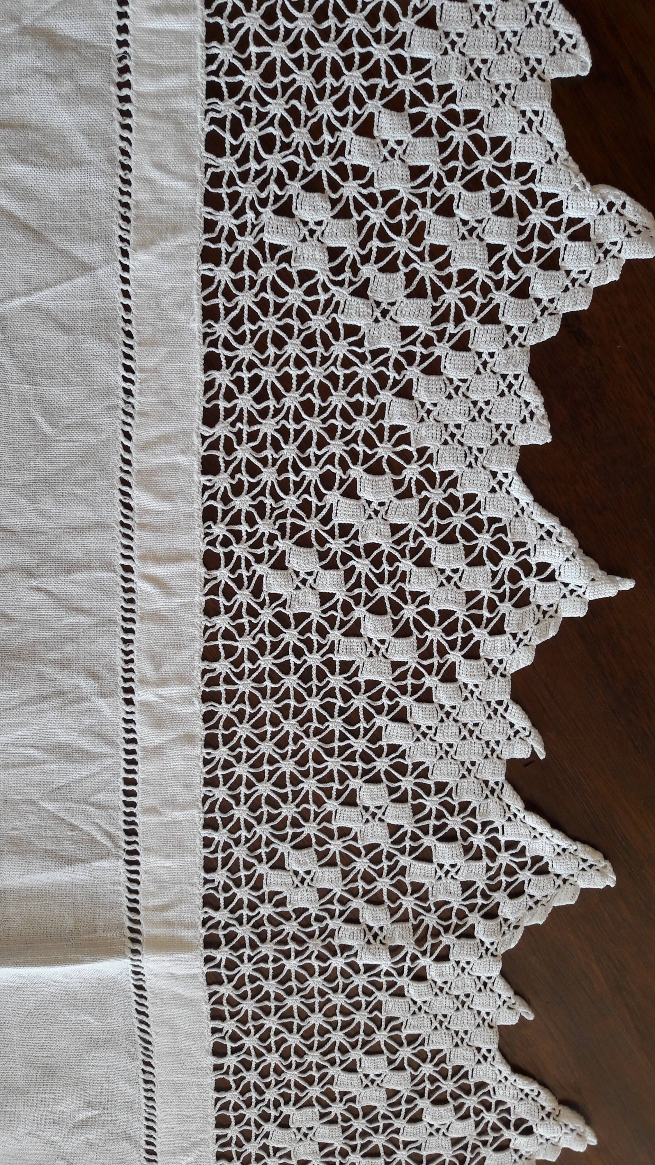 Old hotel tablecloth in white linen