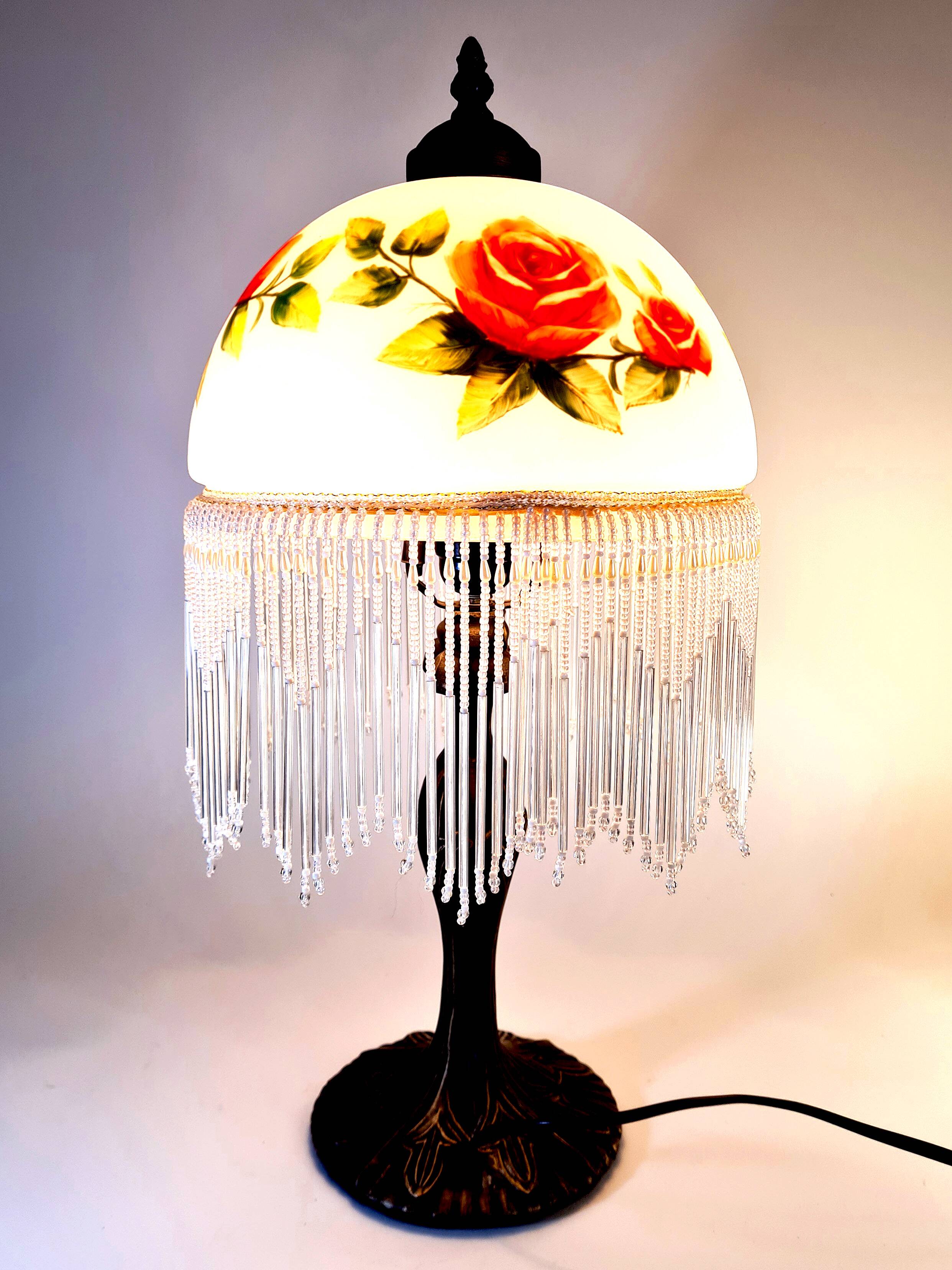 Vintage Tiffany-style fringed lamp with floral globe