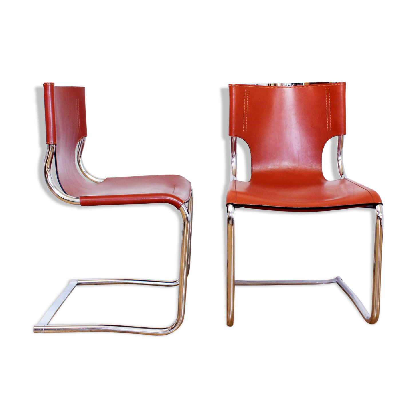 Pair of chairs in leather and chrome tube
