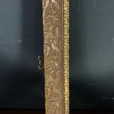 Old frame wood and stucco patinated and gilded