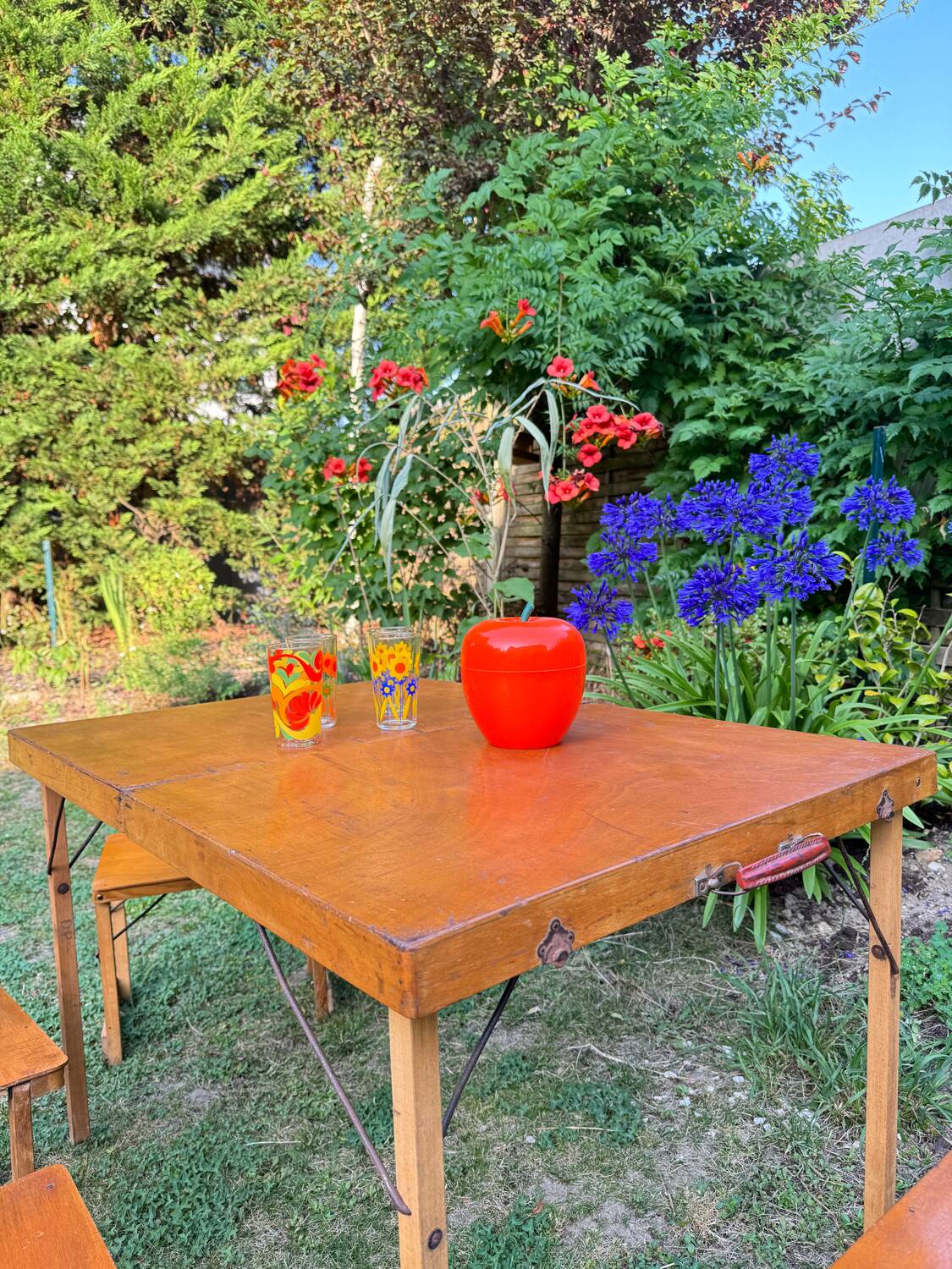 Old suitcase, table and stools, vintage wooden picnic