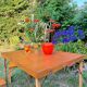Old suitcase, table and stools, vintage wooden picnic