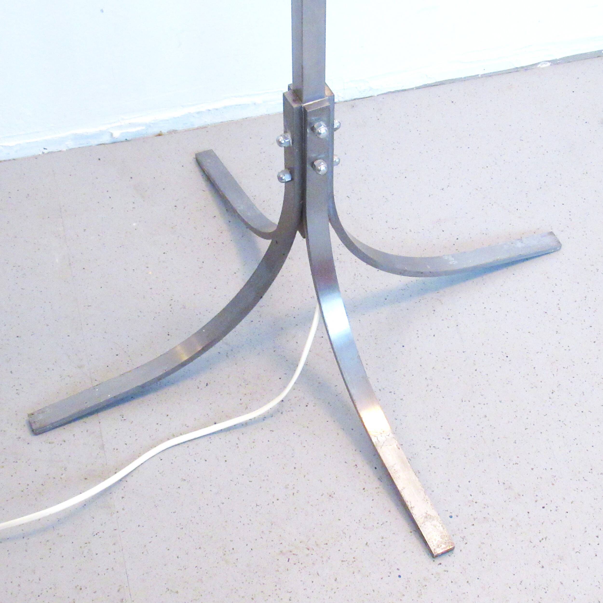 Floor lamp with a large orange shade and metal from the 1960s.