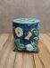 Small flower vase in majolica slipware.