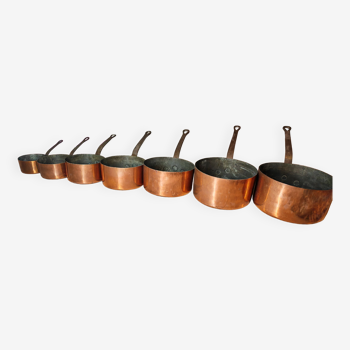 Set of 7 copper pans / brass handle