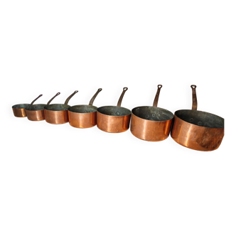 Set of 7 copper pans / brass handle