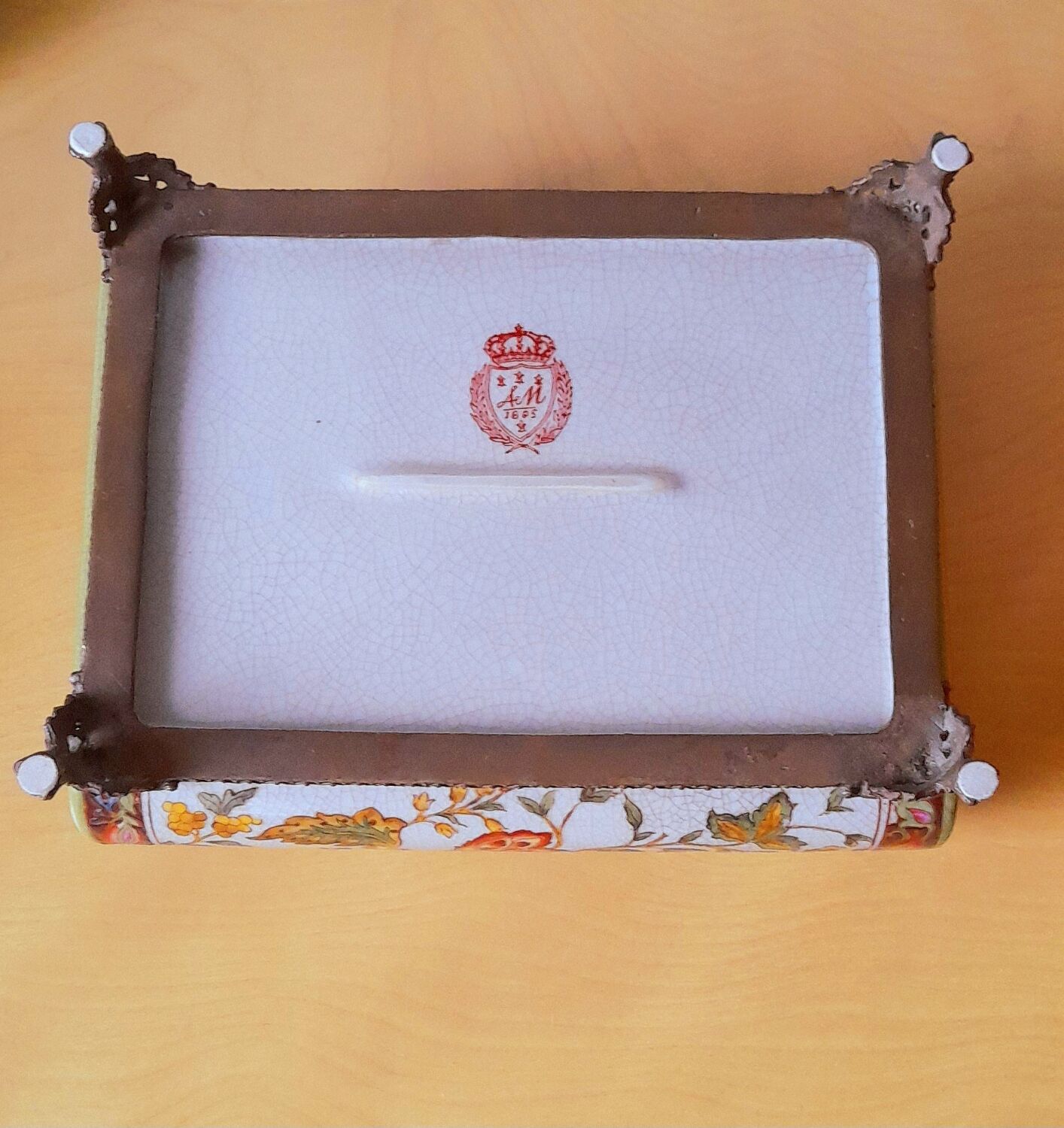 Porcelain box on claw feet