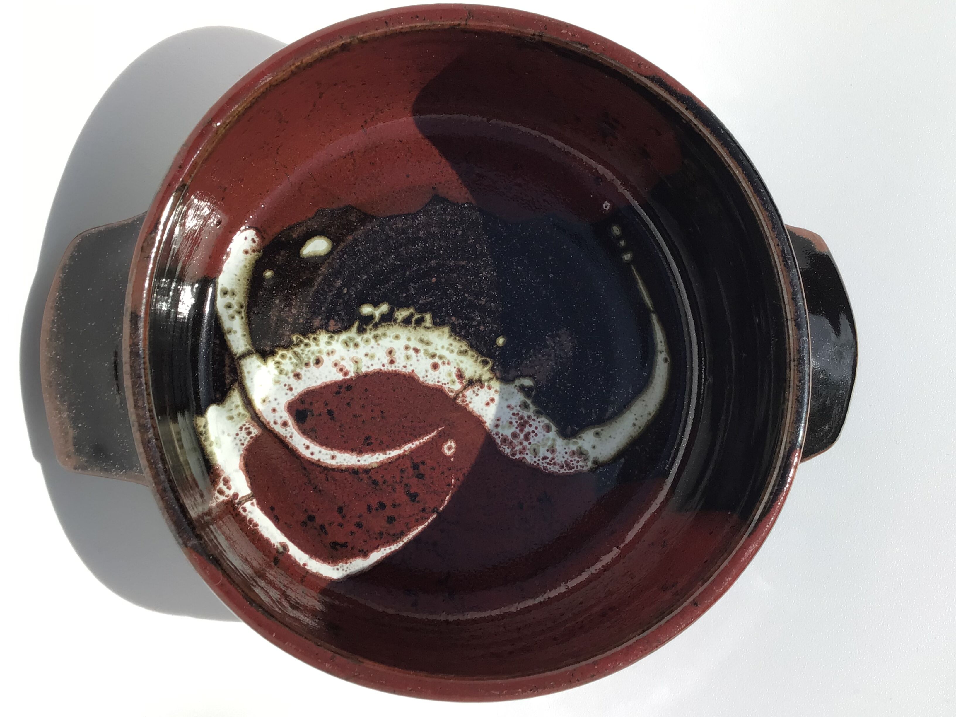 Artisanal sandstone dish signed Guibert red brown decorated