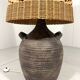 Large amphora floor lamp in pottery with a rattan shade from the 1960s.