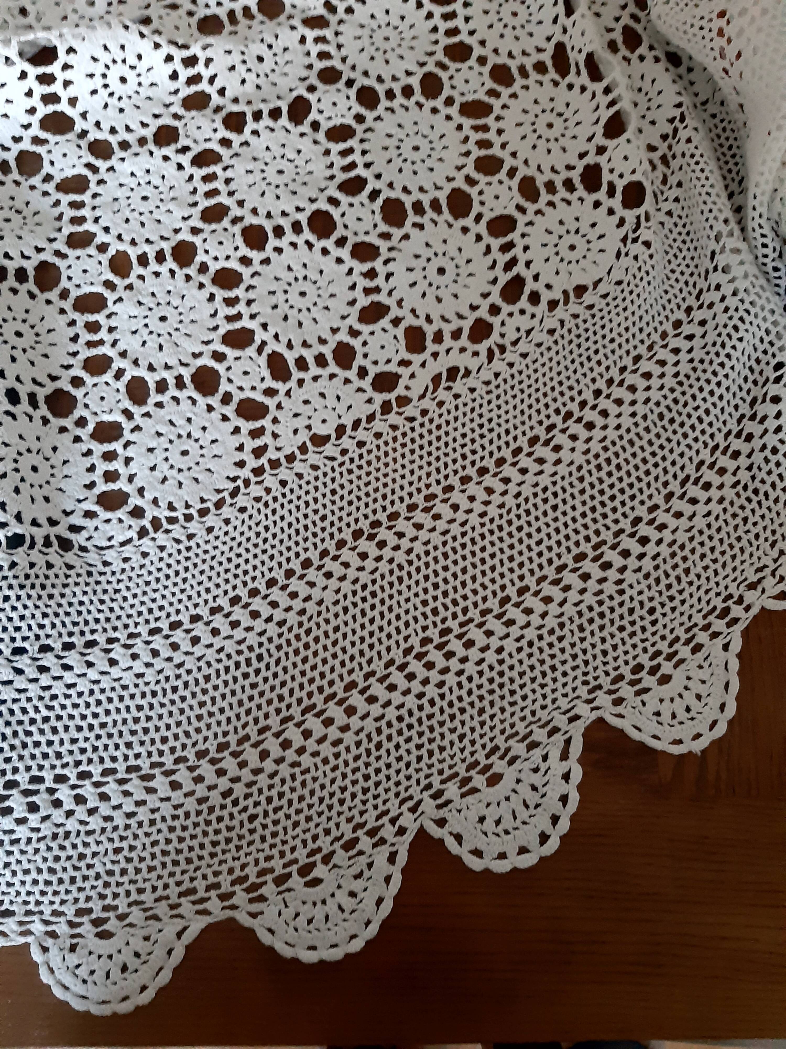 Old crocheted round tablecloth