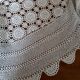 Old crocheted round tablecloth
