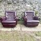 Pair of upholstered armchairs in aubergine imitation leather