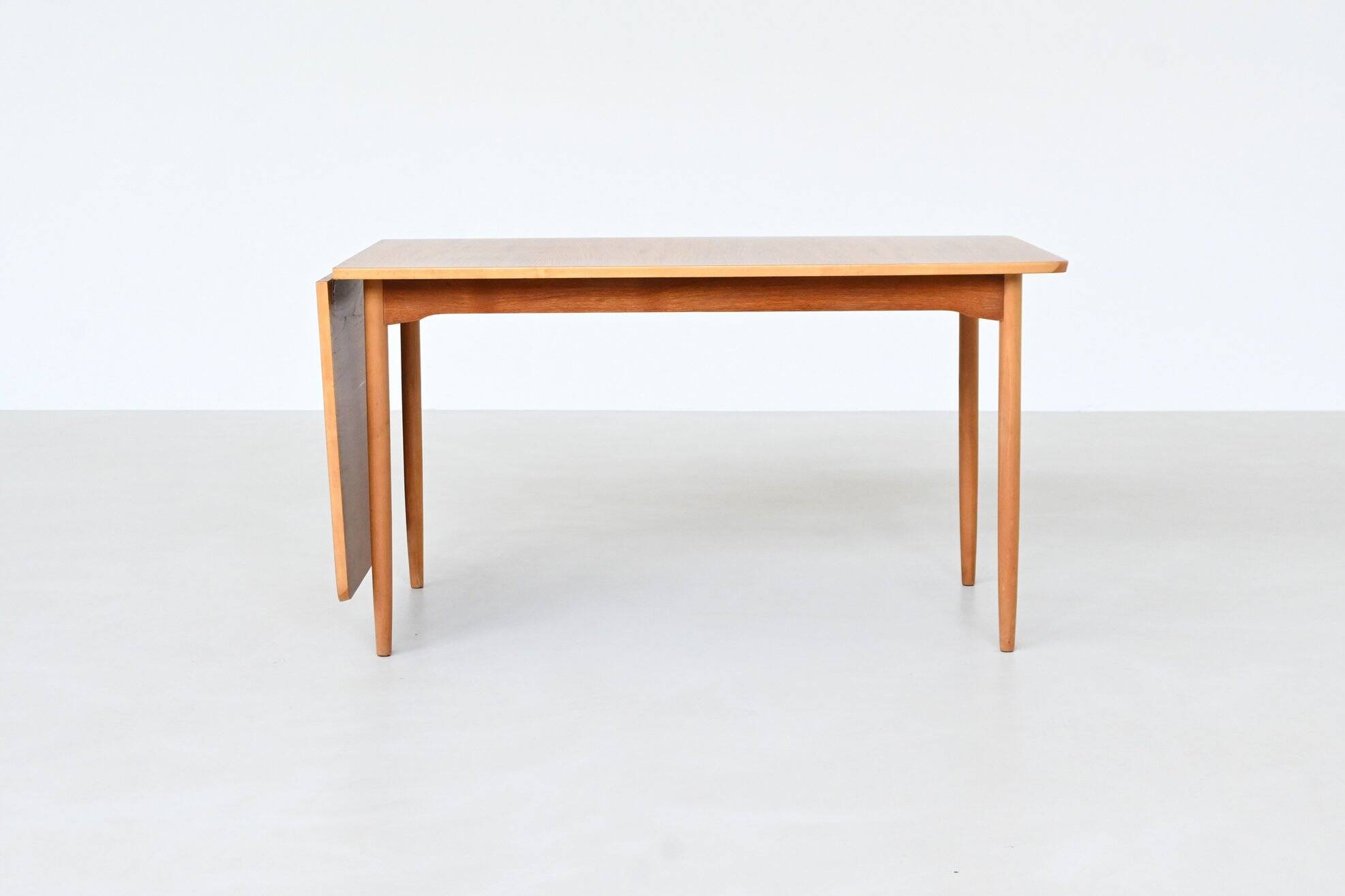 Hans Wegner drop-leaf dining table in beach and teak Denmark 1950