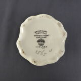 Old yellow ceramic vase decorated with flowers and a pheasant