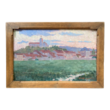 Oil painting representing a village signed and dated 1921