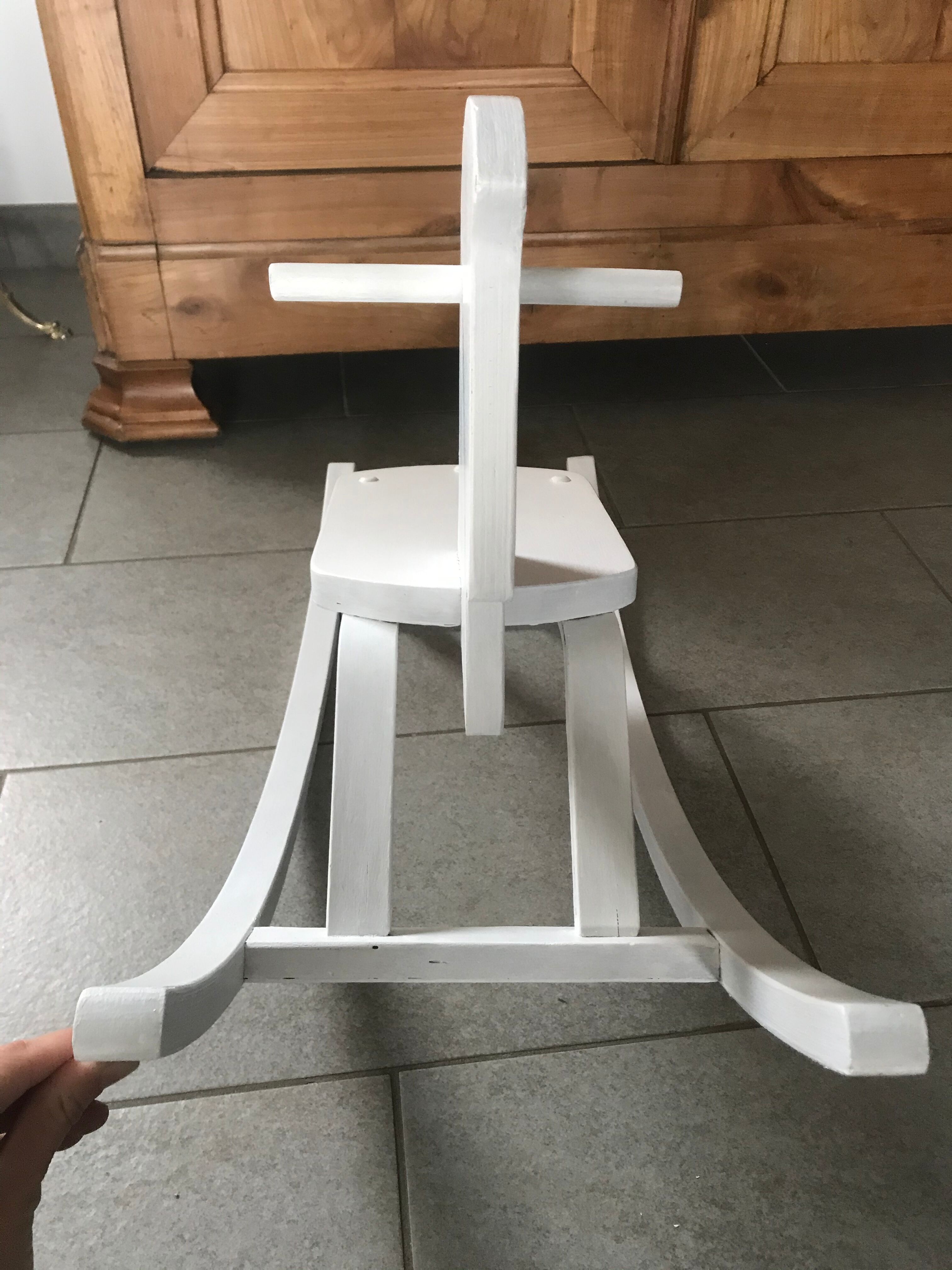 White wooden rocking horse