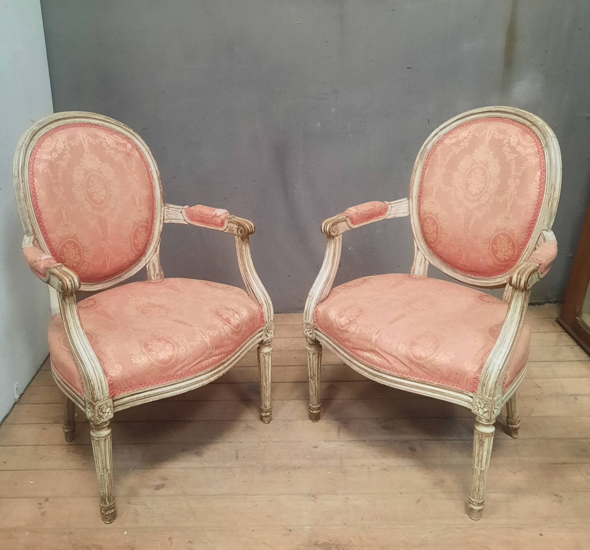 Pair of Louis XVI style medallion armchairs