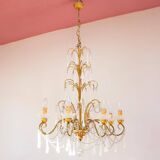 Large golden Italian chandelier with white opaline drops.