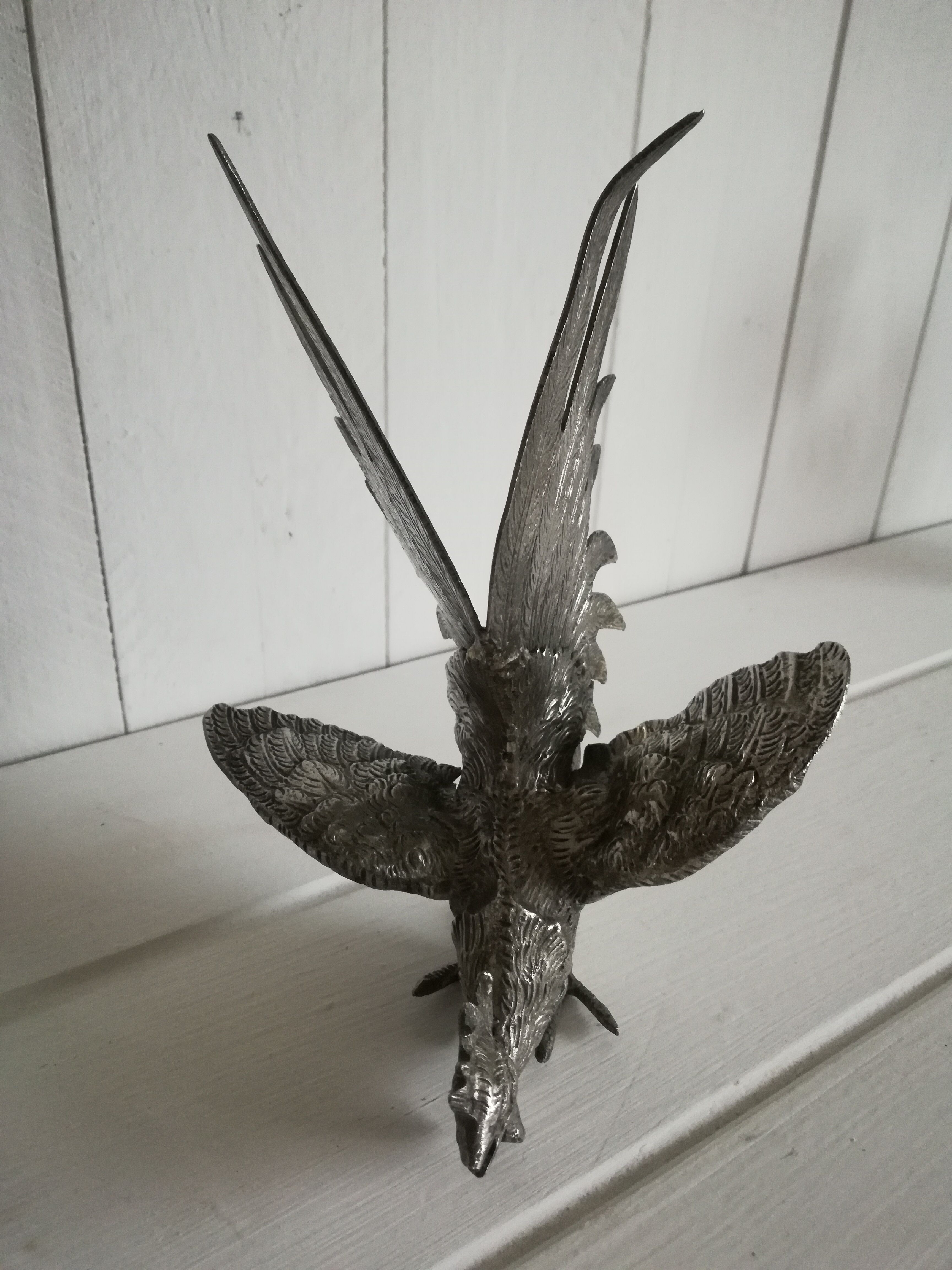 Silver metal rooster / Greenhouse book