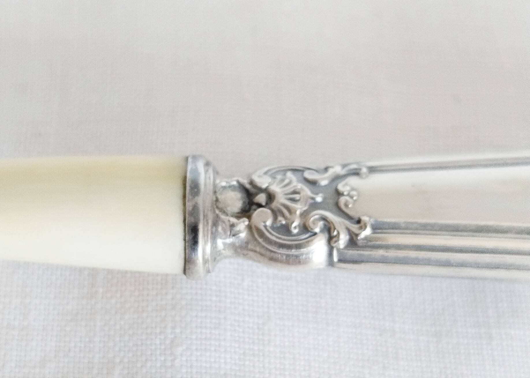 Silver and "horn" porridge spoon