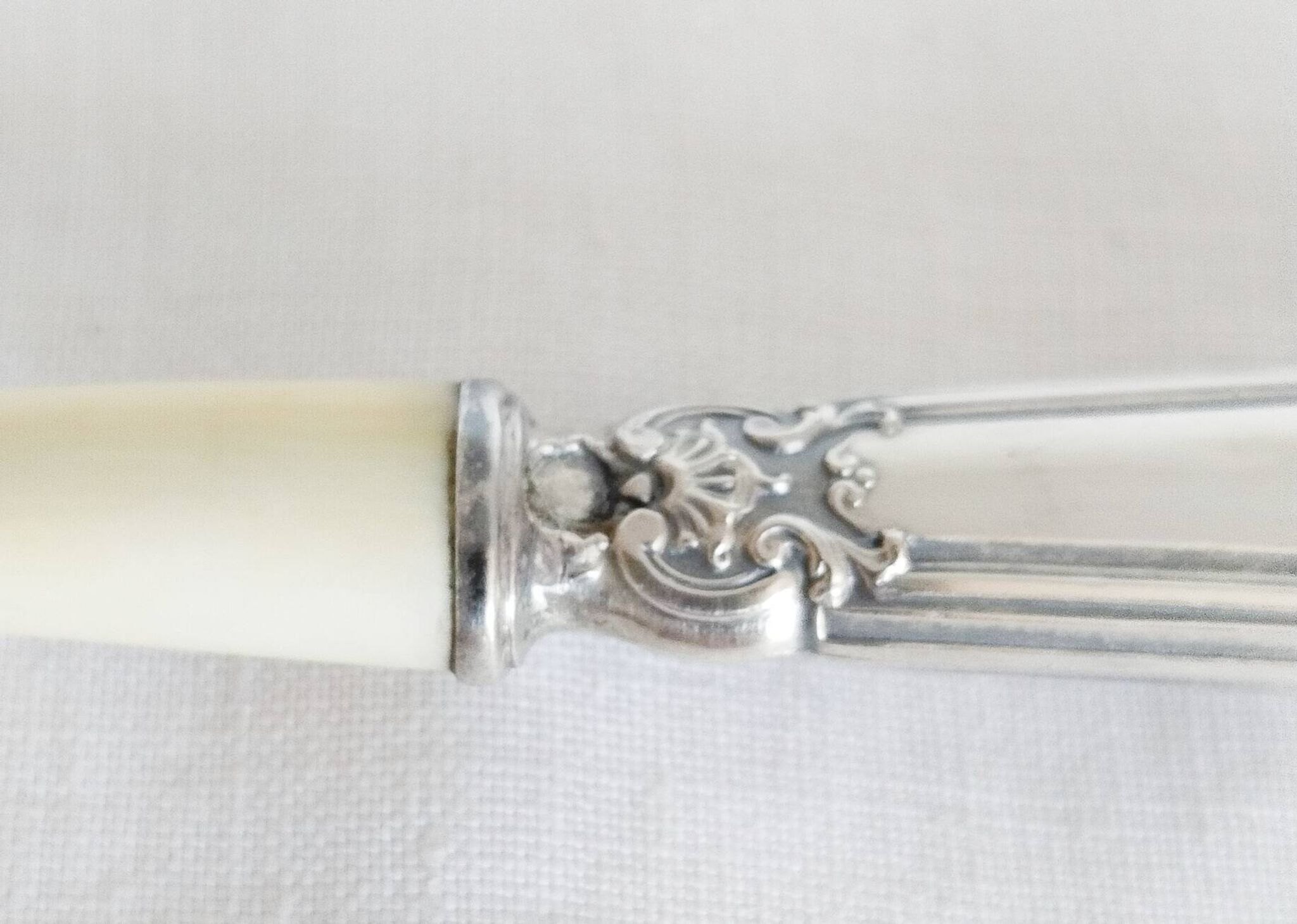 Silver and "horn" porridge spoon