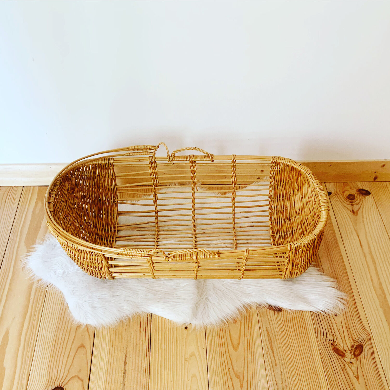 Vintage wicker and rattan bassinet