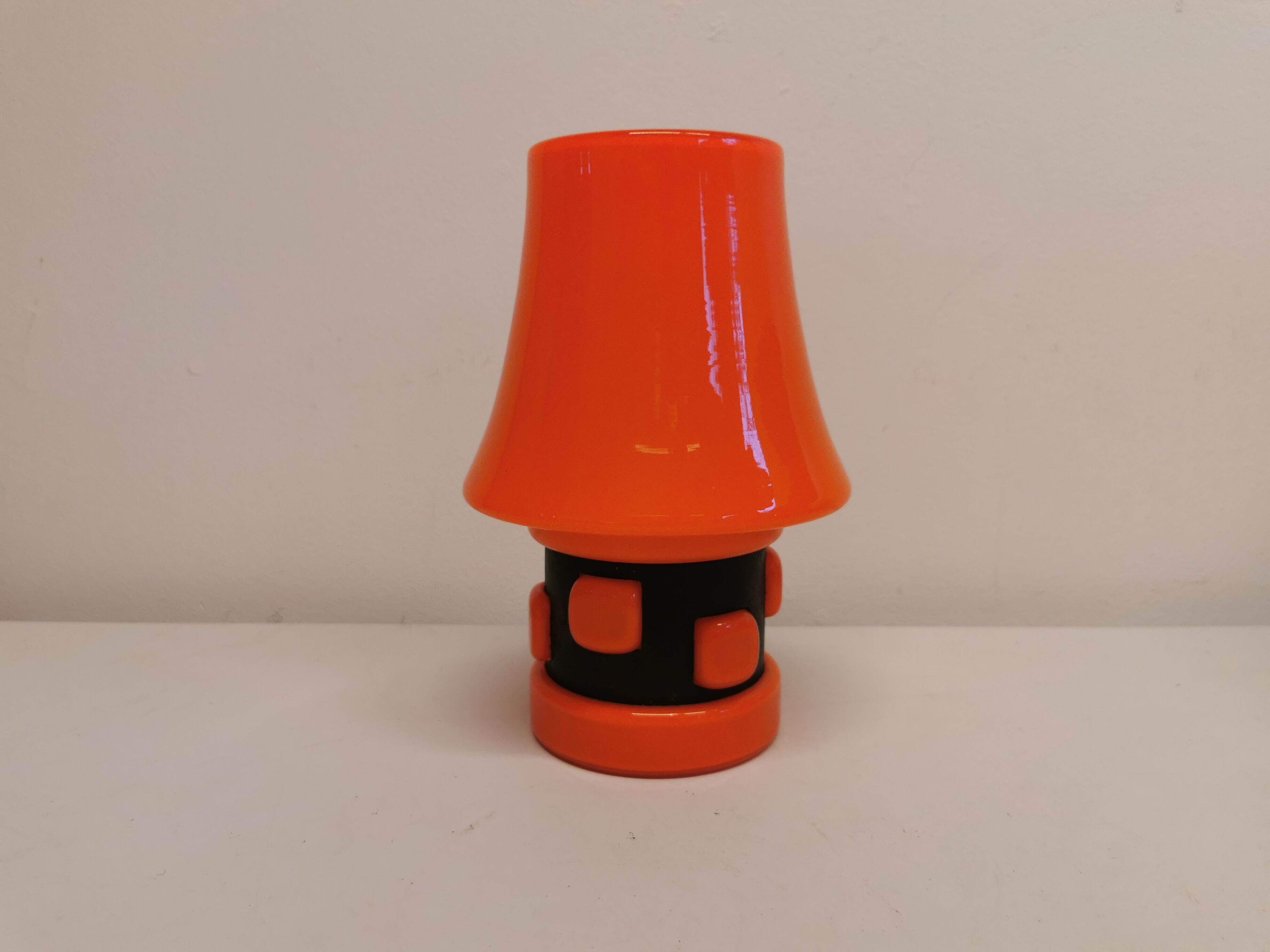 Table lamp, made in red double layer glass with metal details. estimated from the 1960s