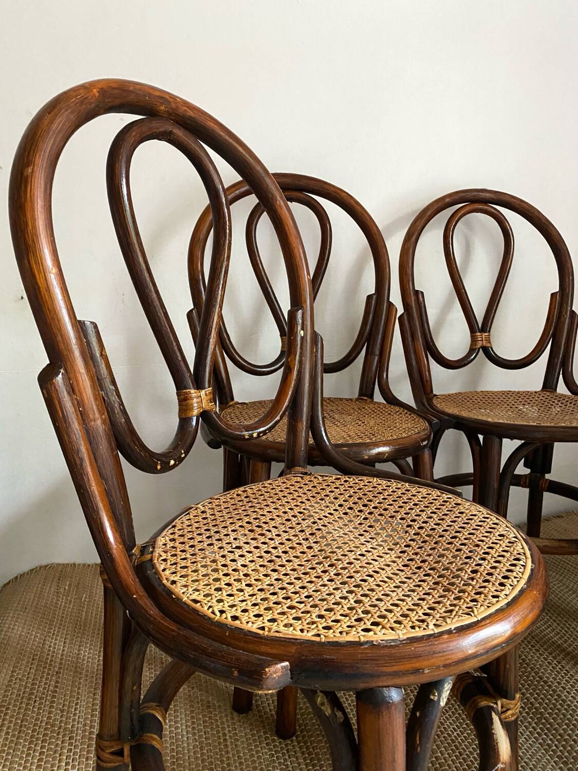 Rattan and cane bistro chairs