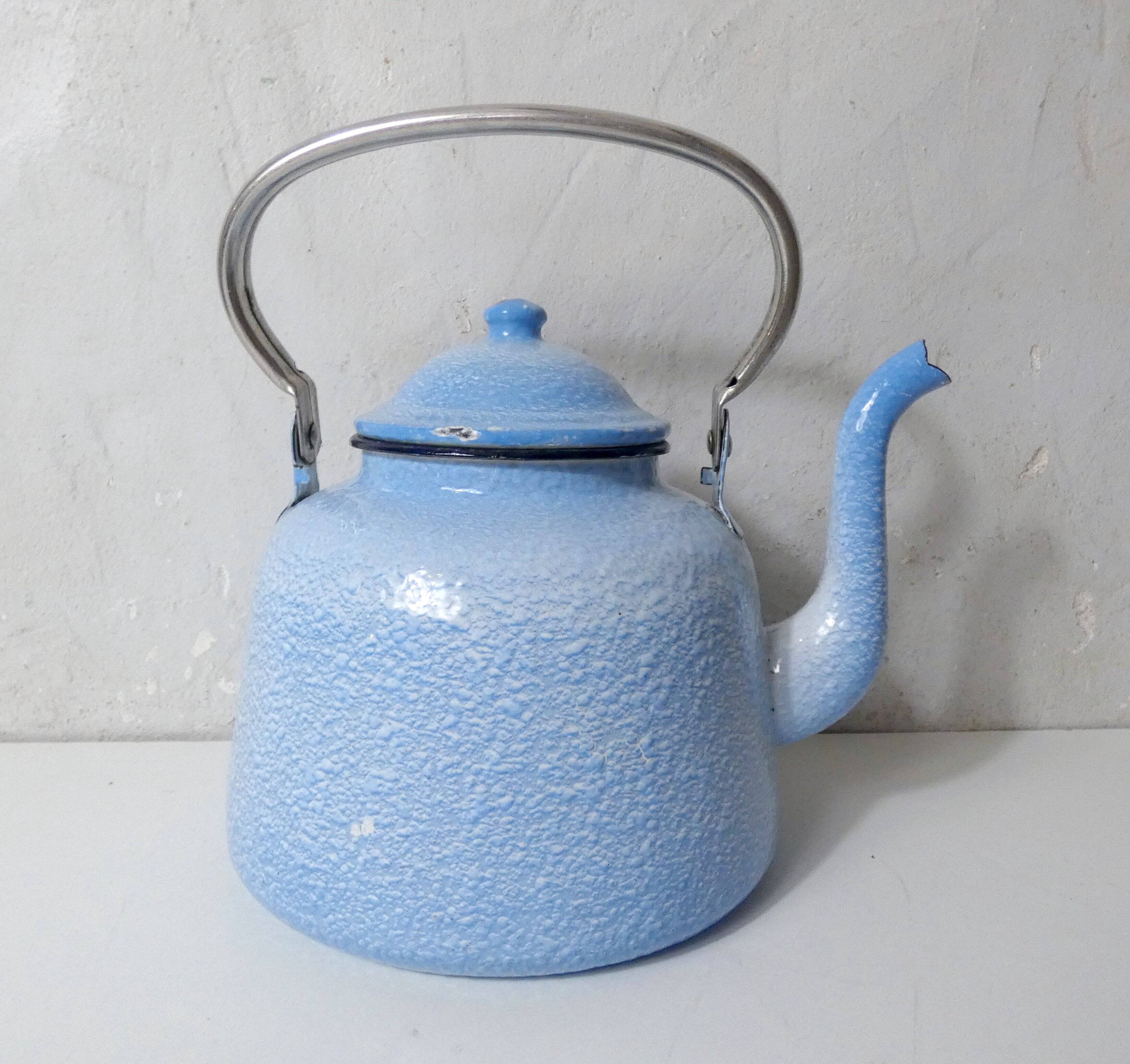 old enamelled steel kettle