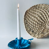 Old enamelled metal candlestick
