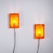Vitrika Nybro amber coloured wall lamps