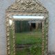 Old mirror with closed screens in golden repelled brass 72 x 42 cm