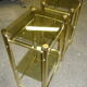 Glass and brass bedside tables
