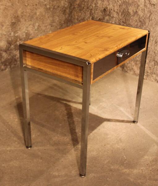 Small dressing table with chrome legs and oak laminate.