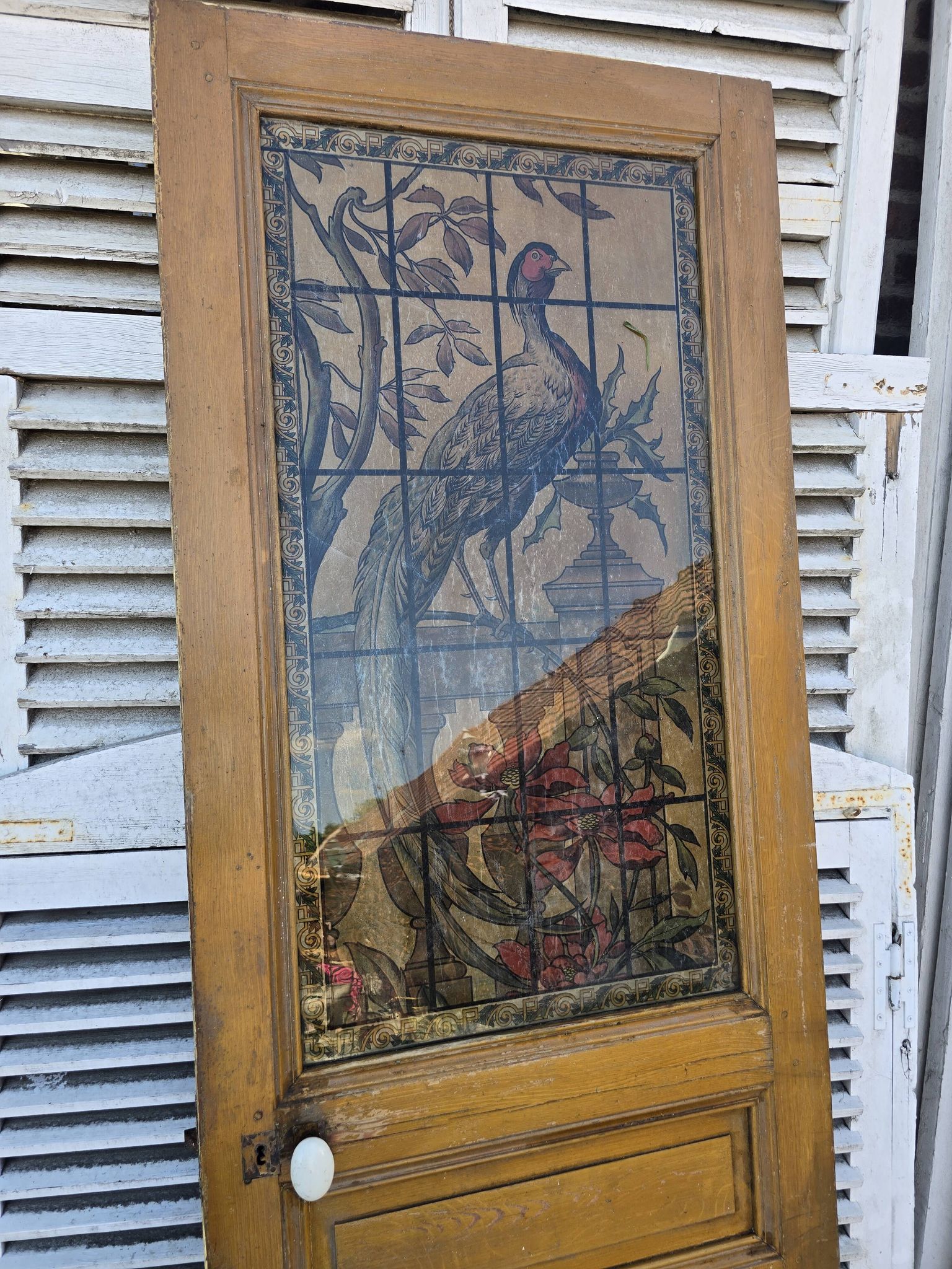 old door with decorated window