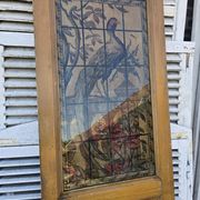 old door with decorated window