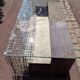 Metal coffee table with a glass top.