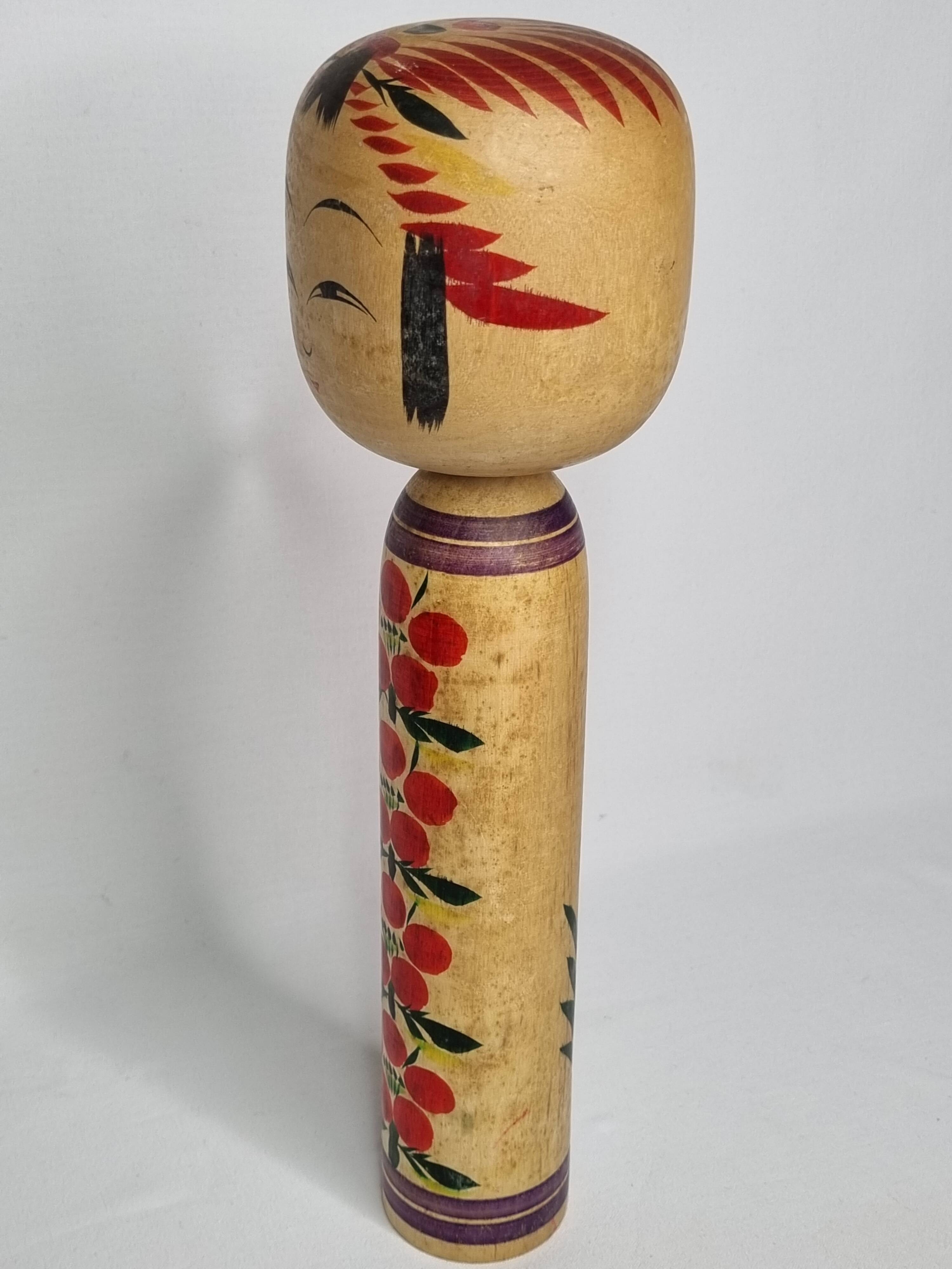 Vintage Japanese Kokeshi doll dated 1986, signed and numbered, floral decoration, 34 cm