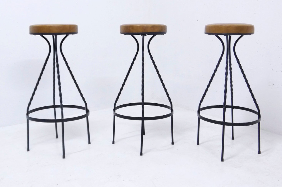 Footswith e.g. wrought iron feet and 60s vinyl seating